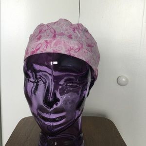 Hair cap with breast cancer ribbon pink.